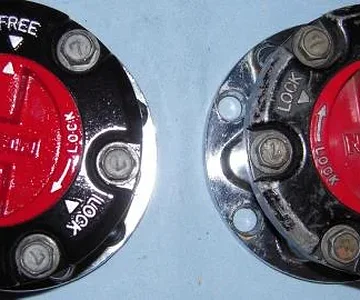 Found a set of IFS aisin hubs, installed the longfield hub gears to convert them to a soild axle hub and repainted the faces.  Before and after the paint