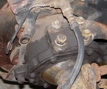 Identifing the axle was made by the little ring on the brake line. It read 6/76, so I assumed it is a 1976 axle, or at least a 76 brake line, with the small pattern knuckles.