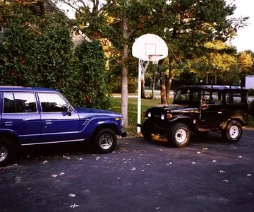 My first taste of what Toyota Land Cruisers were all about.  My 1988 FJ62 and my brother's 76 FJ40, taken mid-90's.  I had the privilege of being "in charge" of the FJ40 for a time, so I consider that brief period to have been a part-40 owner, it was grea