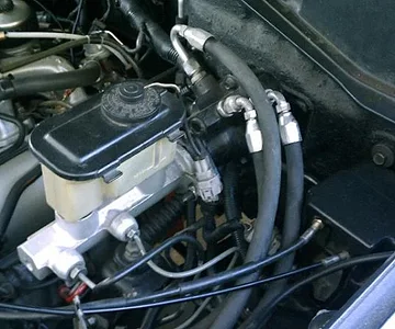 Winter 2010 >> Also salvaged from that vehicle was the Hydroboost brake system which was modified to work with the FJ80's brake system. This system was actually put in during the summer of 2009 when the original 3FE was still the power plant for this vehi