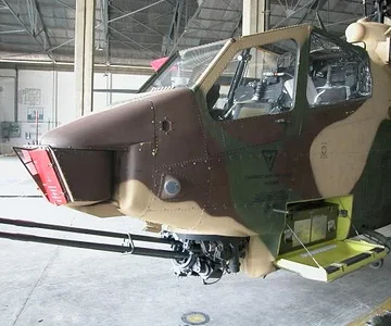 Wanna Play?

AH-1F Cobra. Basically a "Stuka" with Rotor Blades. Gets the job done, though..."Death is our business and Business is Good".