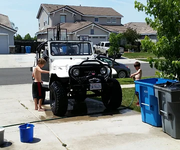 Buddies kids washing the rig