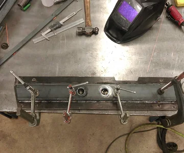 Low profile crossmember