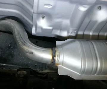 cat over framerail to muffler