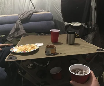 Rain has come, we retreat inside the tent