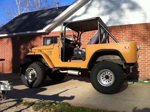 1972 fj40, 350cid, 3" lift, 33s, 10mpg, front disk brake conversion and a never ending place to funnel money.