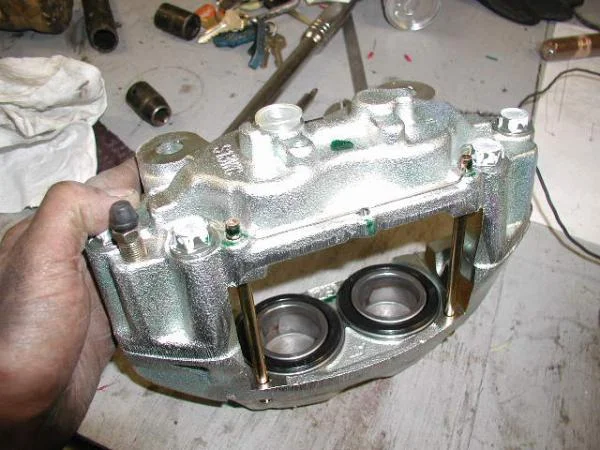 80 series front brake caliper