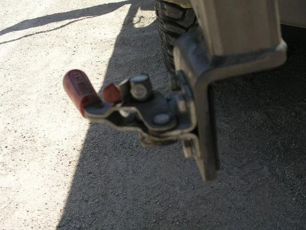A little blurry but you are looking at a sheered off 'U' Bolt on my DeStacco tire swing latch.