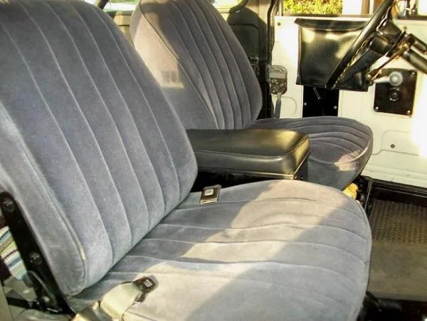 ANOTHER VIEW OF THE SEATS. I HAD TO ALSO GET ANOTHER "EMISSION CONTROL / FUEL SEPERATOR DEVICE" WITH A COVER & MODIFY THE FUEL LINES TO FIT MY 1971 FUEL TANK. IT WORKS OUT GREAT! YOU CAN SEE THE TOOLBOX. SINCE I TOOK THIS PICTURE I MODIFIED THE TOP & IT F