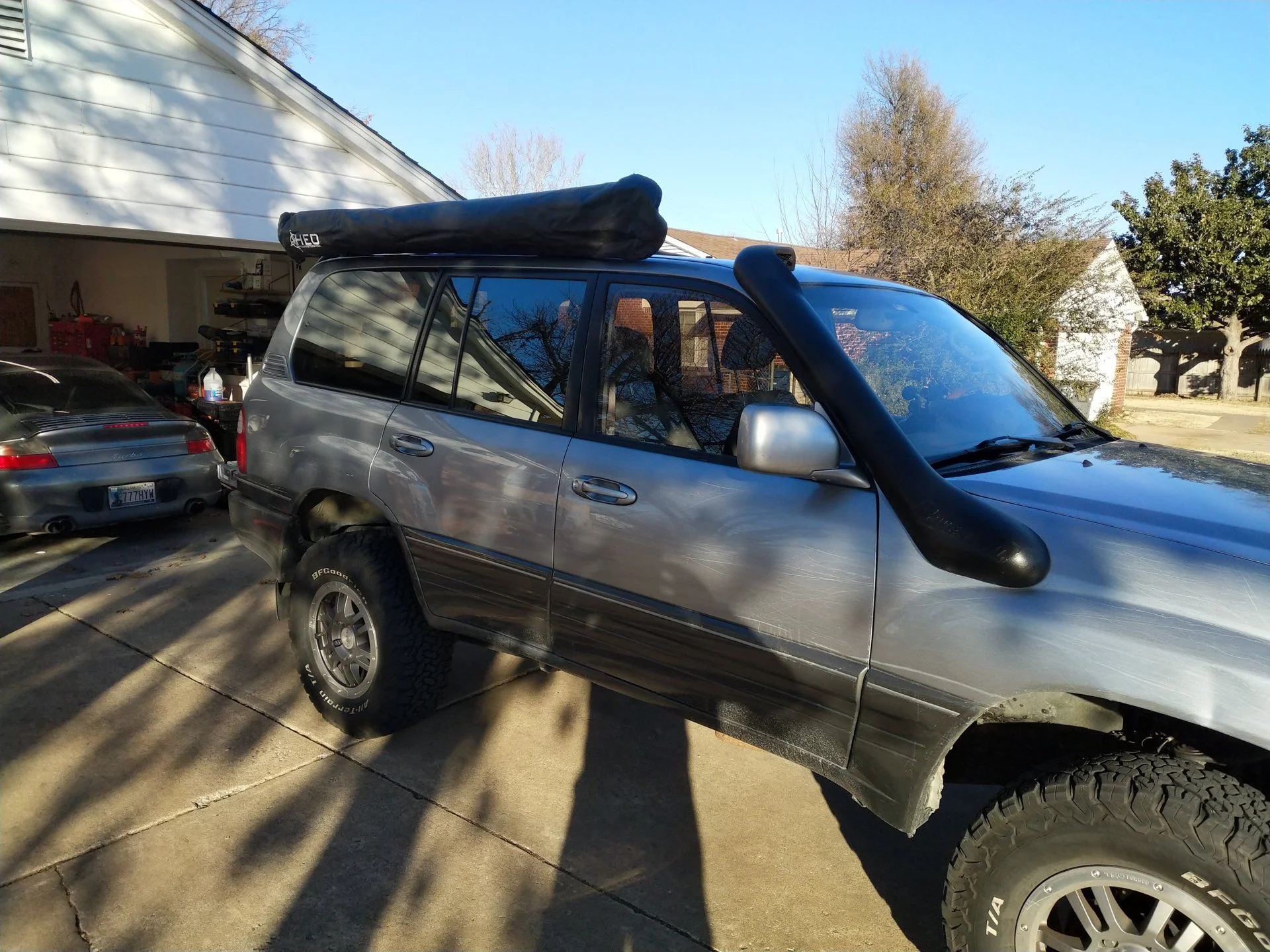 Awning mounted on stock rails