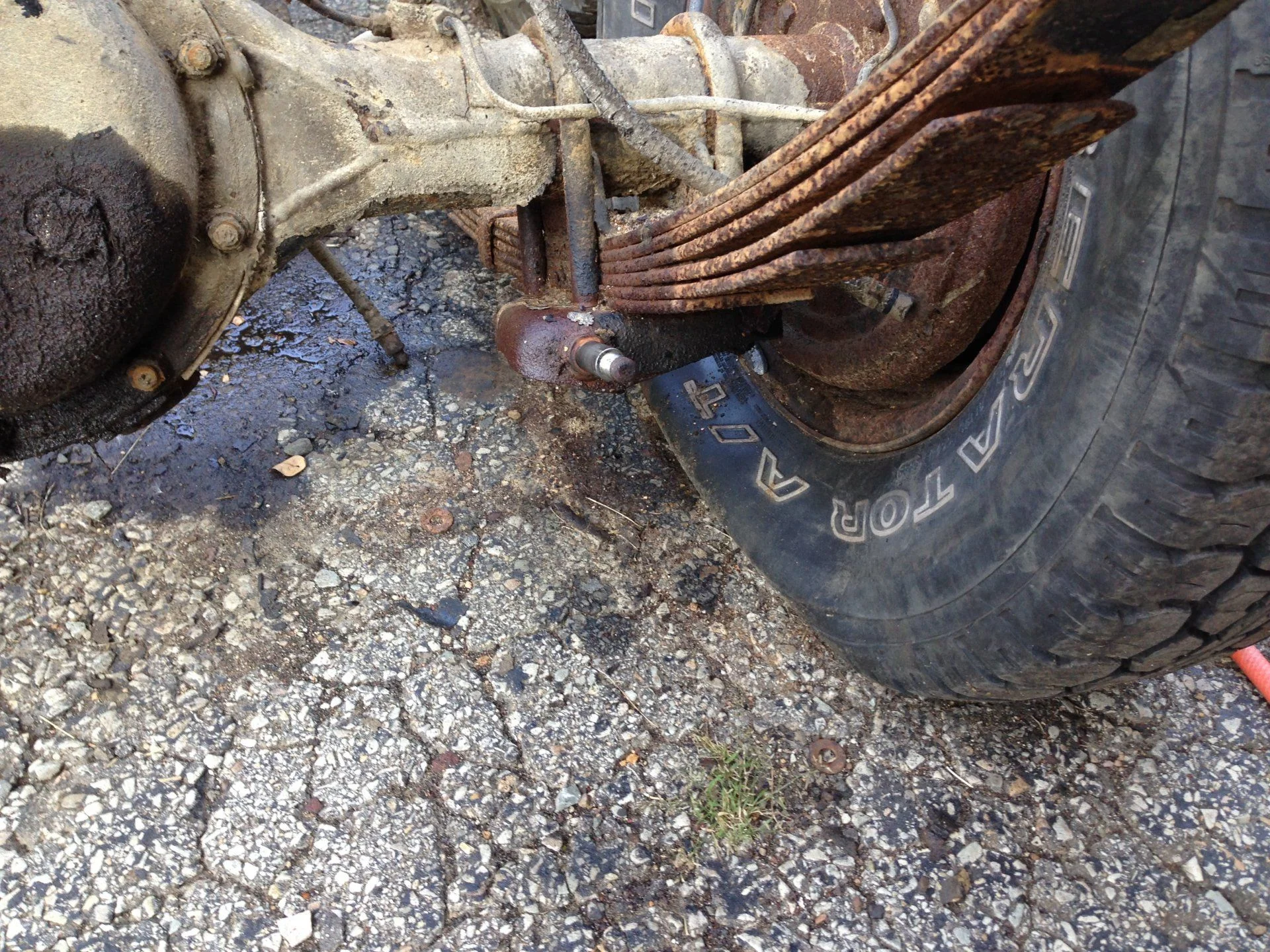 Axle and suspension removal rear pass side leaf spring view 4