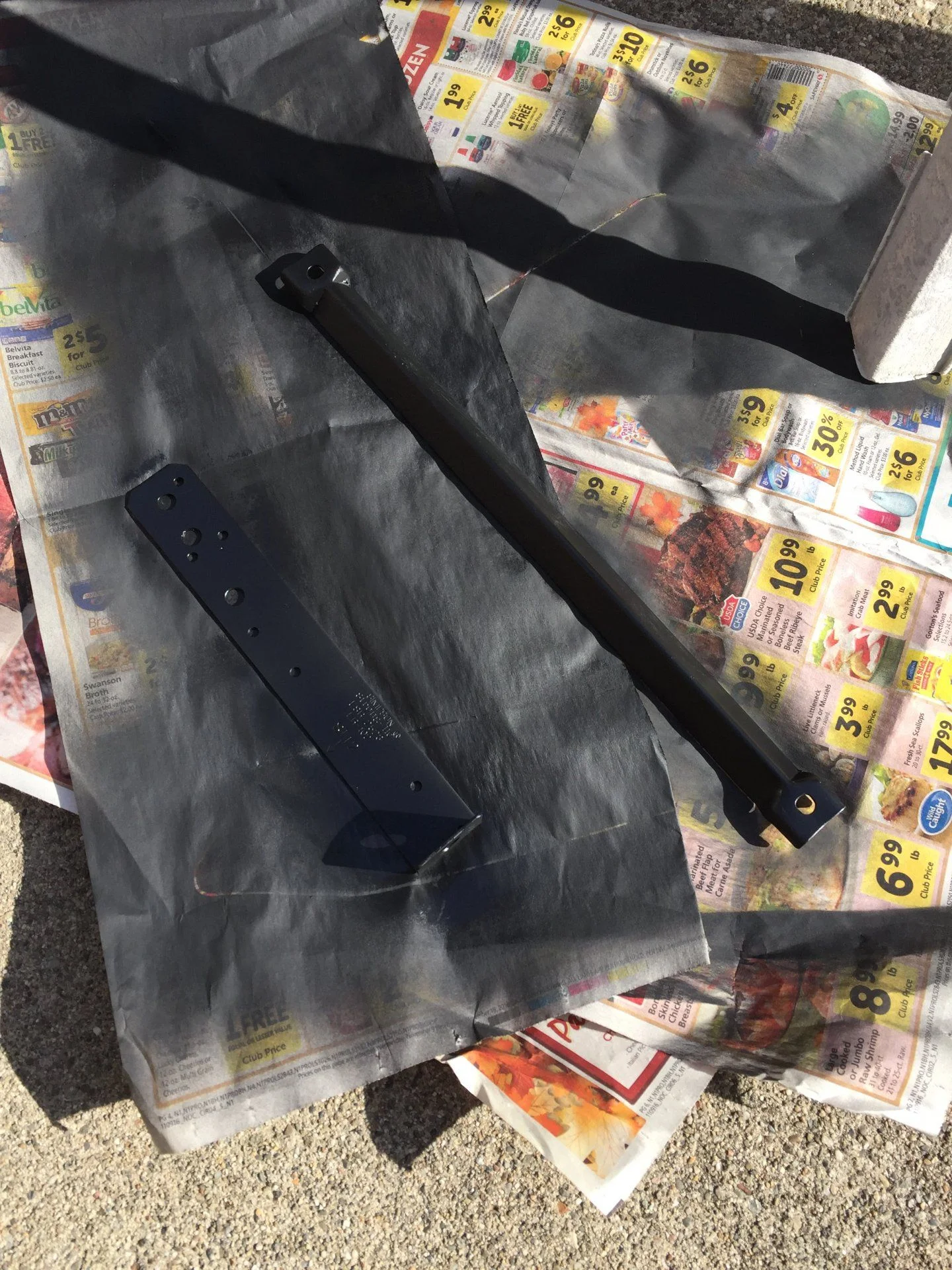 Bent and sprayed (sprayed the battery tie down bar also)