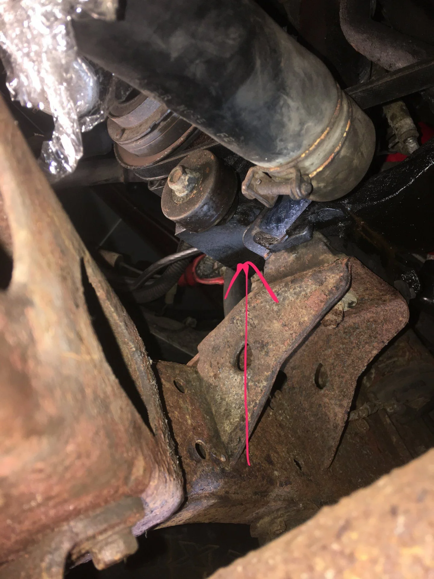 Broken hose clamp mount under ac compressor pic 1