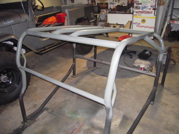 Cage getting primed with self etching primer