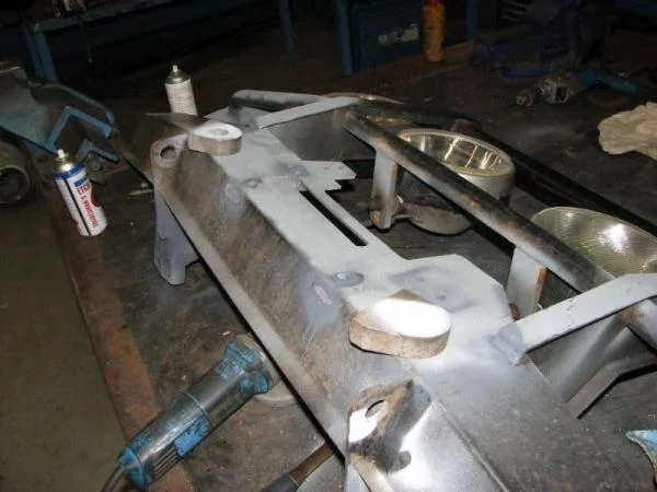 Cut existing lugs and weld new (22mm) lugs onto bar