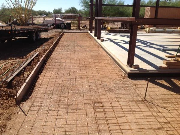 East end 7.5' side walk and drive. 17 yards of mud.