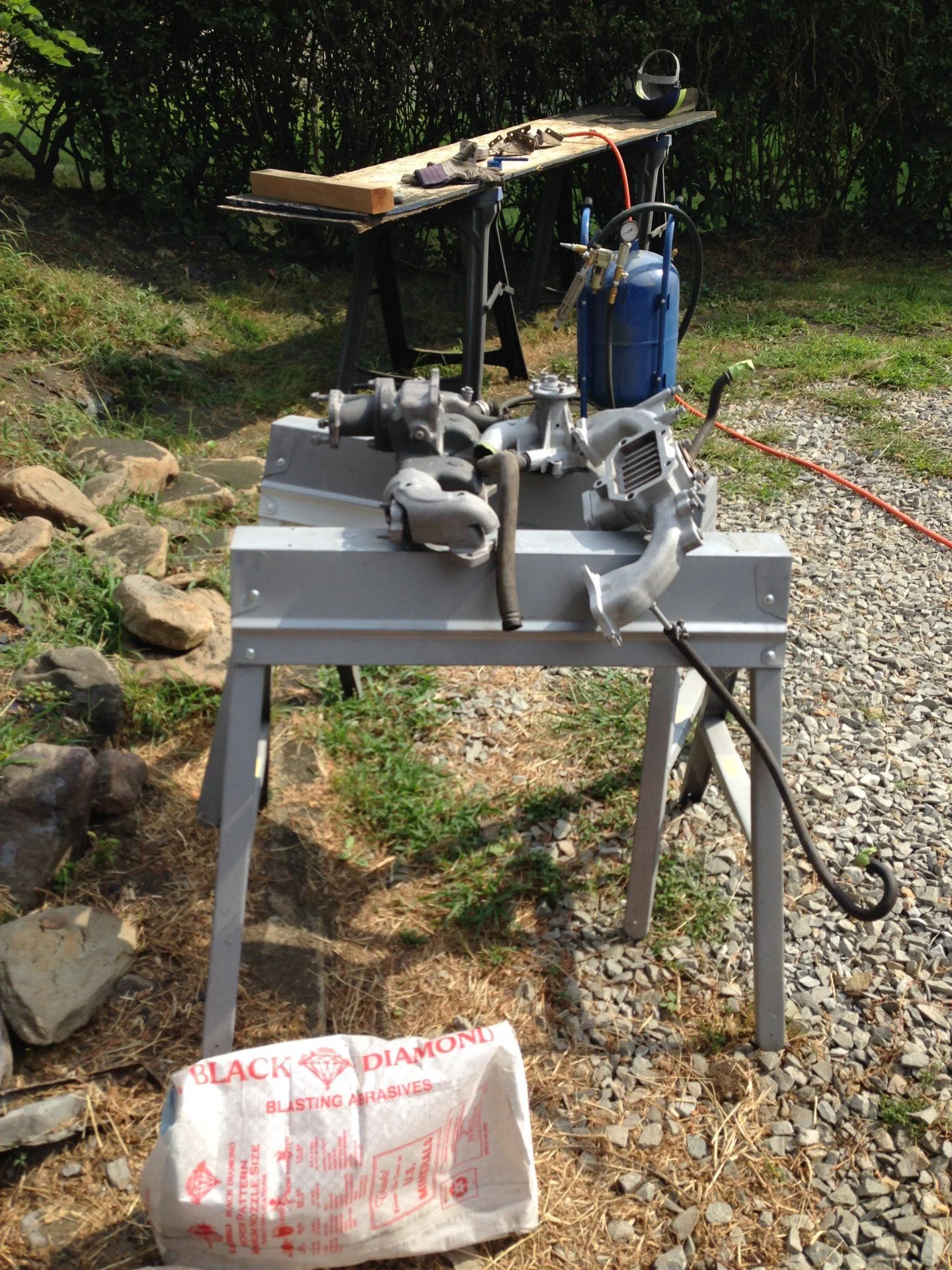 Engine intake and exhaust sandblasted view 1