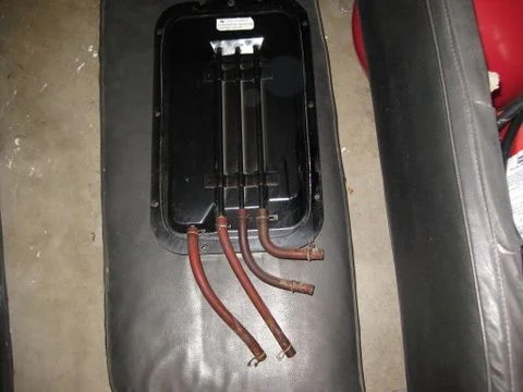 Evaporative tank(goes in the back of the middle bench seat)
2 longer hoses were connected to gas tank, shorter ones to filler and to unknown location :) ( did not have time to trac it down but it looks like it is going to carburetor).
