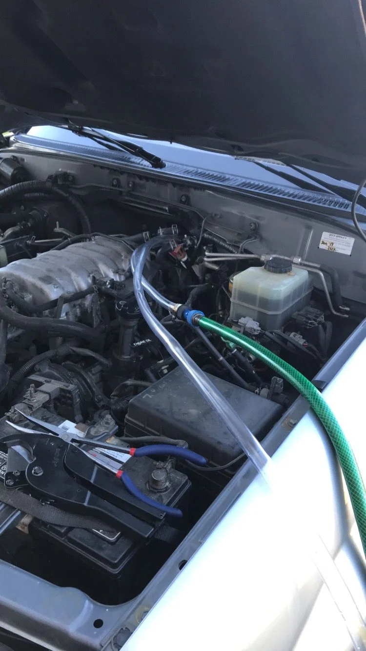 Flushing the heater core. It was putting out maybe 80 degree air on full max.