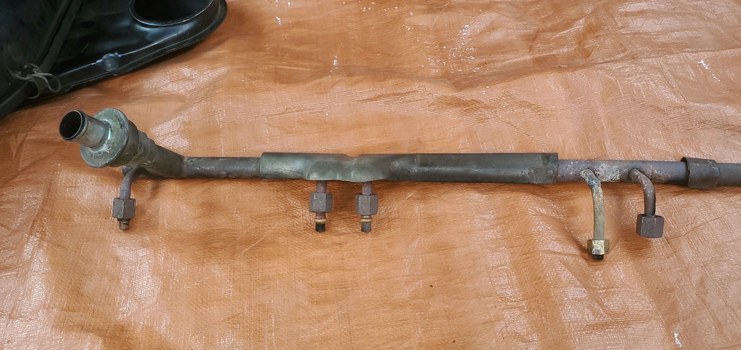 Frame rail with different fittings