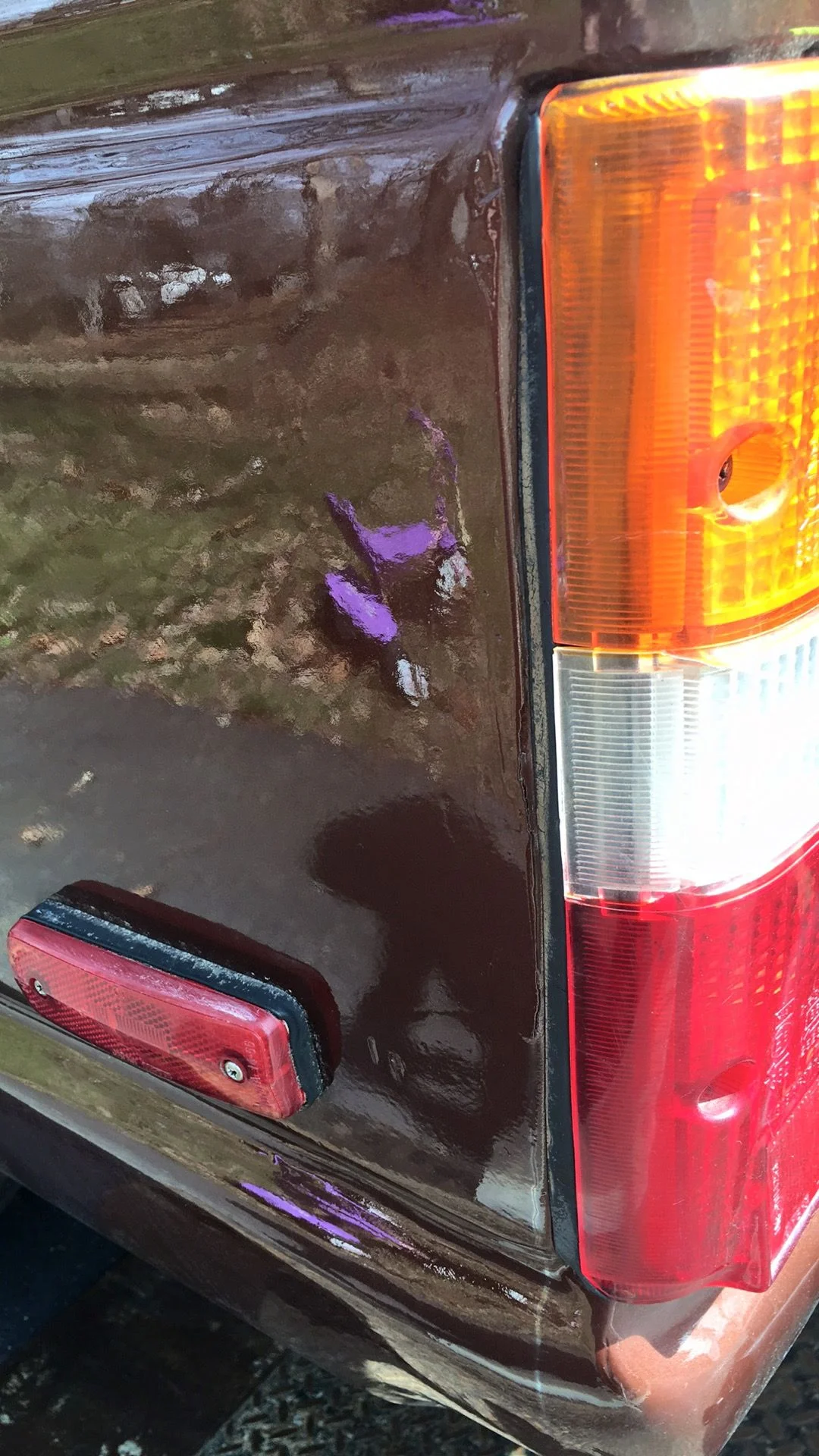 Gap between taillight and car