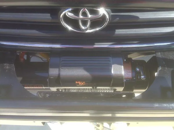 Had to trom the top plate of the bumper for a better fit and access. I did install the wireless remote kit. Much easier.