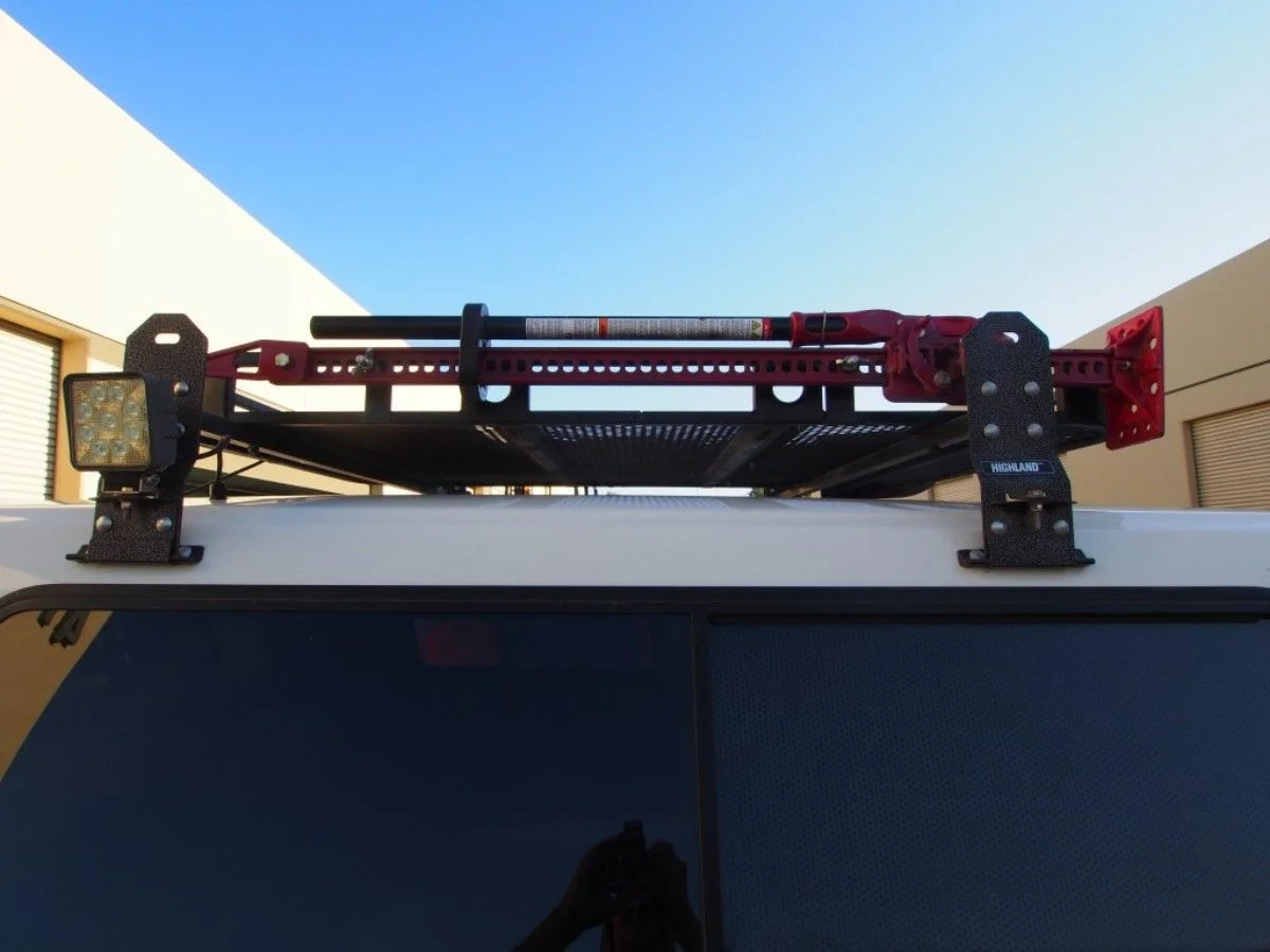 Hi-lift mount. Used 1/2" bolts with turned spacers and 1x1/8" steel strip.