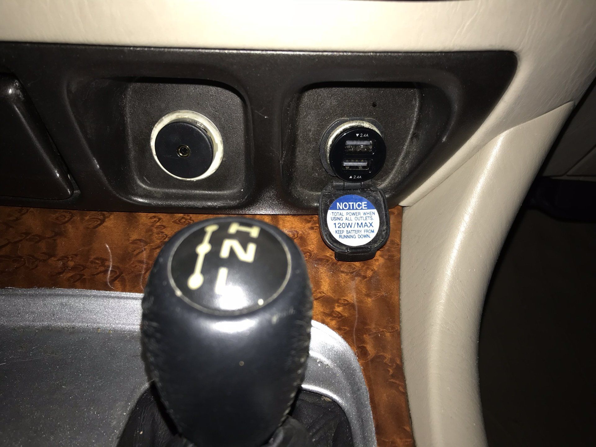 Installed a GROM aux input. Wish I'd just done bluetooth to avoid all the cables, but it works flawlessly.
