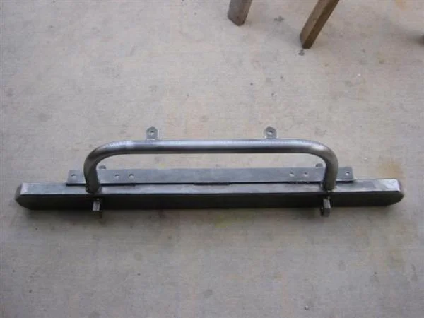 Long trapezoid ended FJ40 bumper.