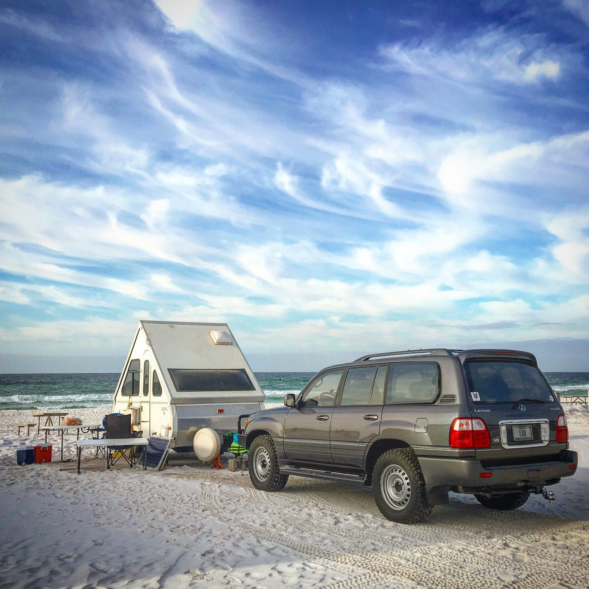 LX470 with Aliner Scout Pop-Up on Miramar Beach, Florida.