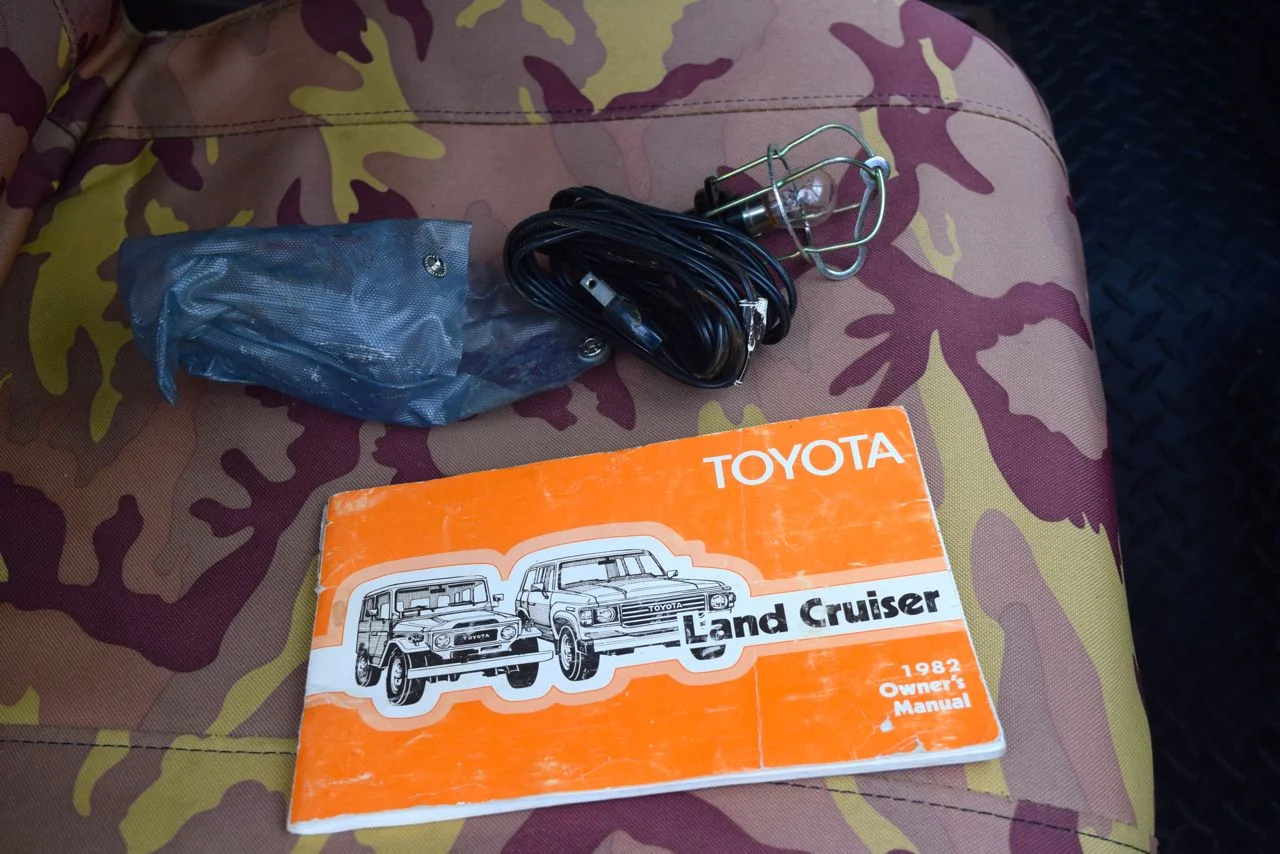 manual and trouble light (plugs into socket in glove comparment)