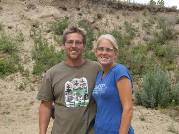 me and wife posing in our gravel/sand pit