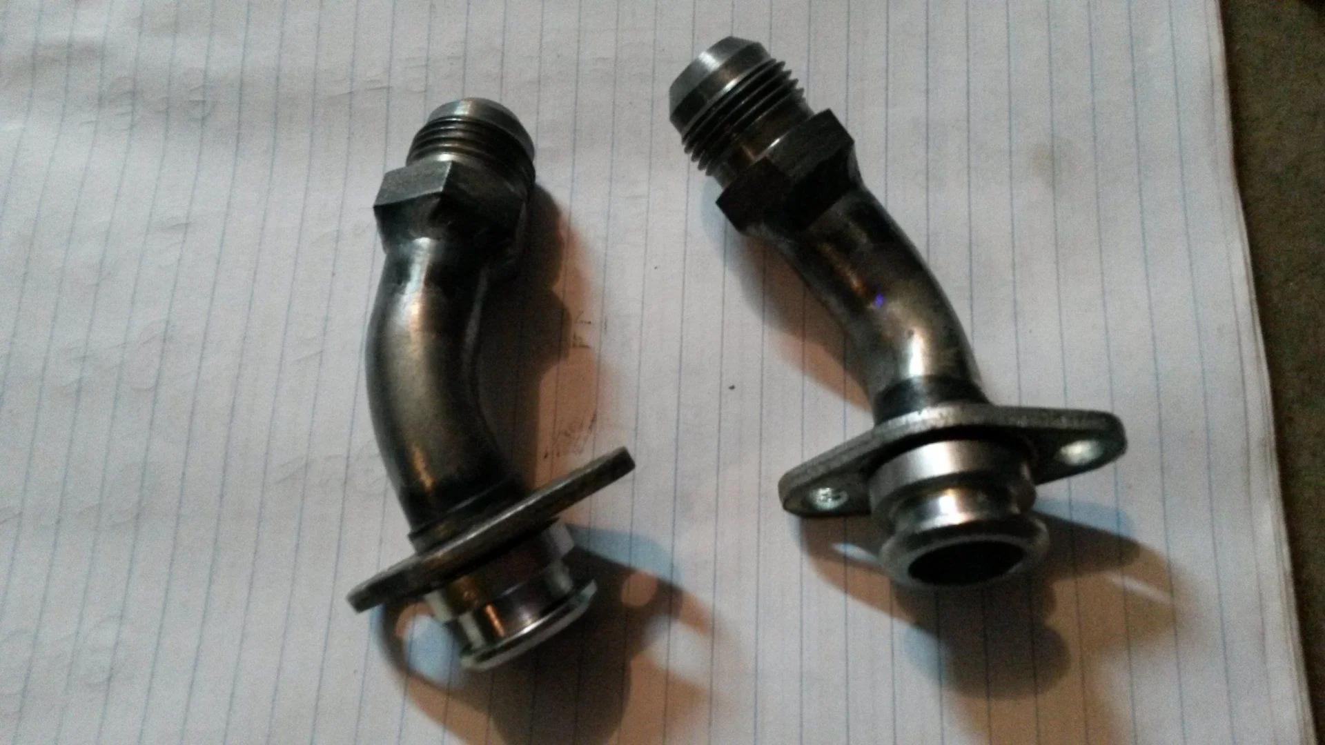 Modified oil cooler fittings