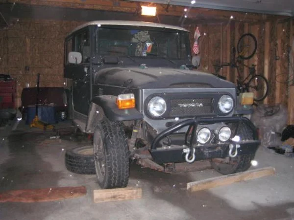 my fj40 March 2009 snowing that day started my suspension lift project..