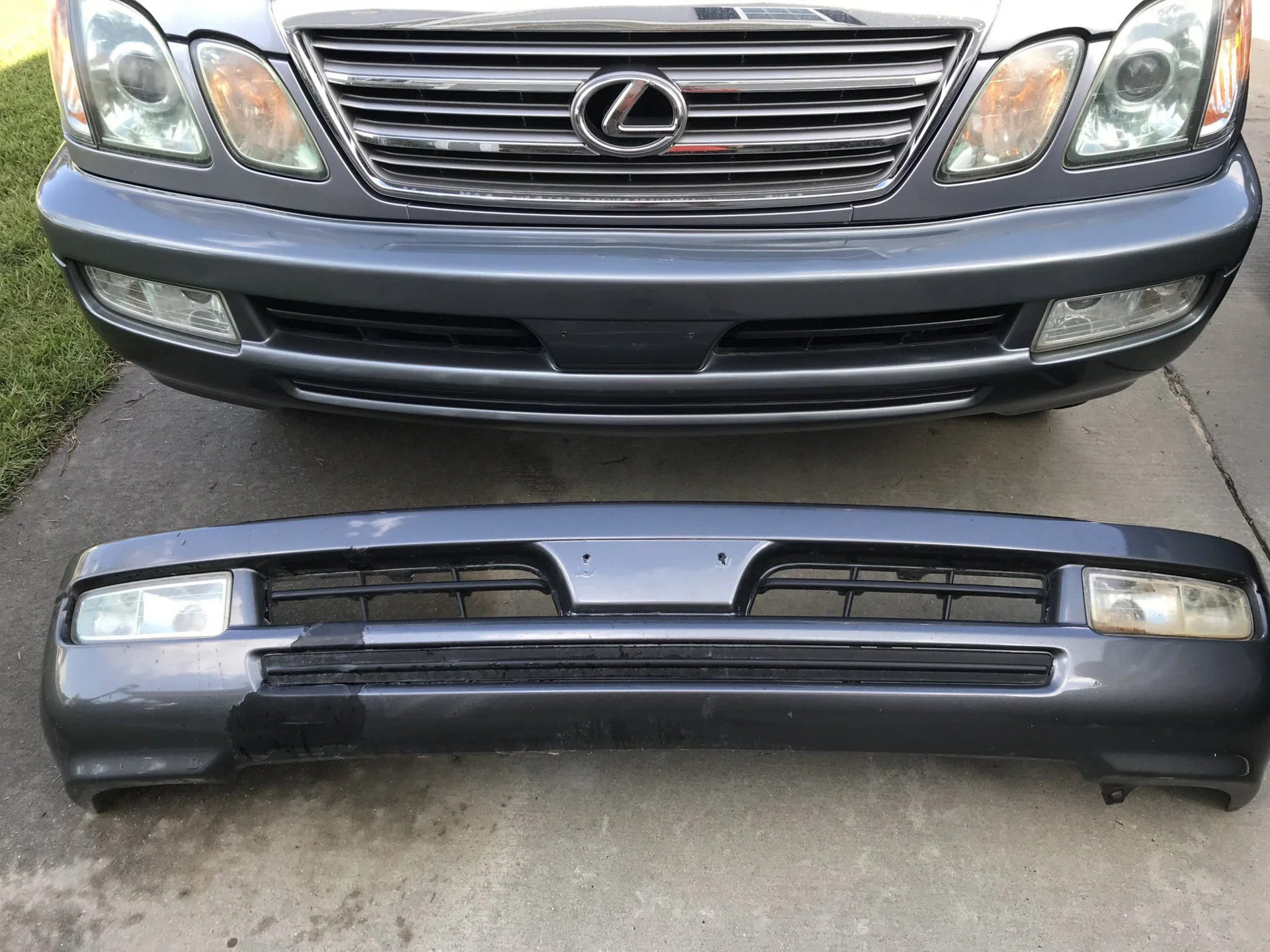 My old bumper had a huge section of flaking paint and cracked fog light housings that were full of mud and held together with tape.