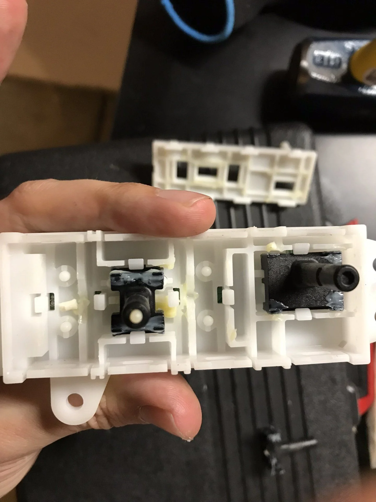 My power seat controls never worked right, so I broke them apart, cleaned out some broken bits of plastic, and now everything works