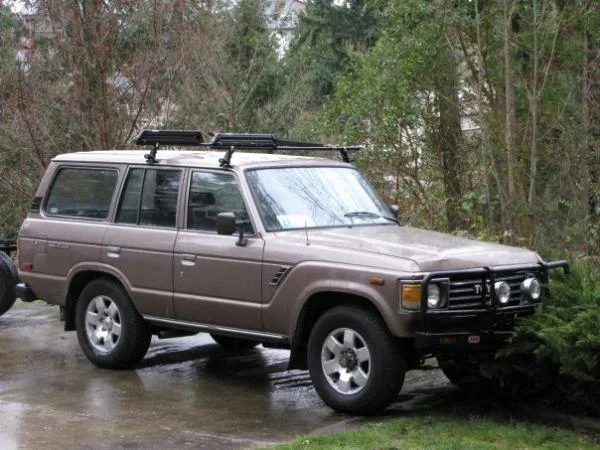 My Rig 85 FJ60 in her infancy - 350 Small Block Conversion butted up to a Marks of Aussie adapter, Holley Truck Avenger Carburetor, ARB Front Bumper, Ramsey 8000 pound wench, Stock FJ Crusier Wheels and Tires, Custom Exhaust, Redone Interior and Stereo an