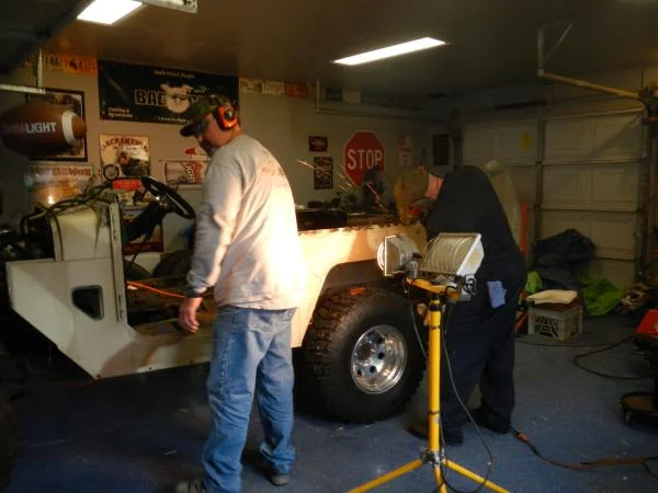 Neighbor Perry teaching me the ropes