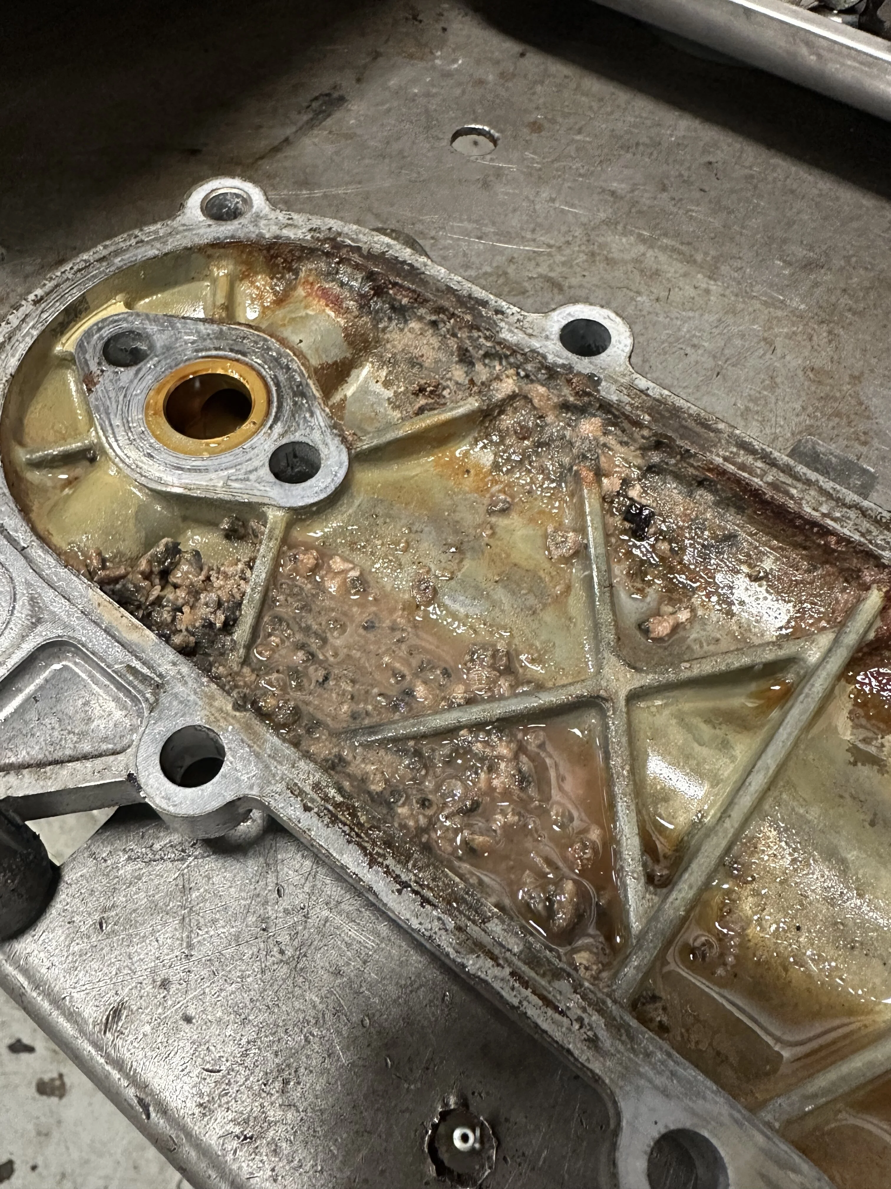 Not sure what was going on inside the oil cooler cover but it was gross