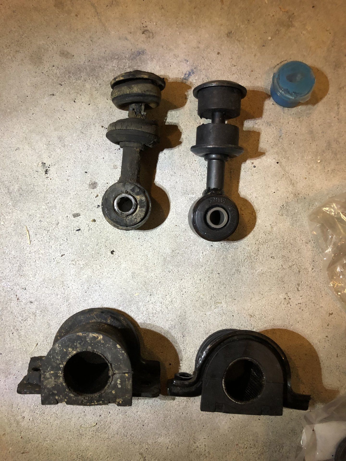 Old vs. new - front sway bar end links and bushings