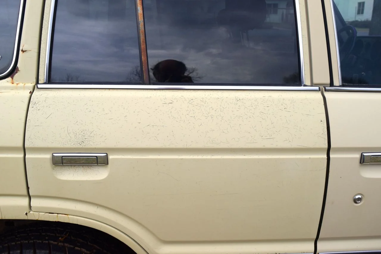 paint on passenger rear door is crackling, no rust yet