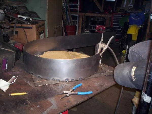 Sheild being welded into a circle