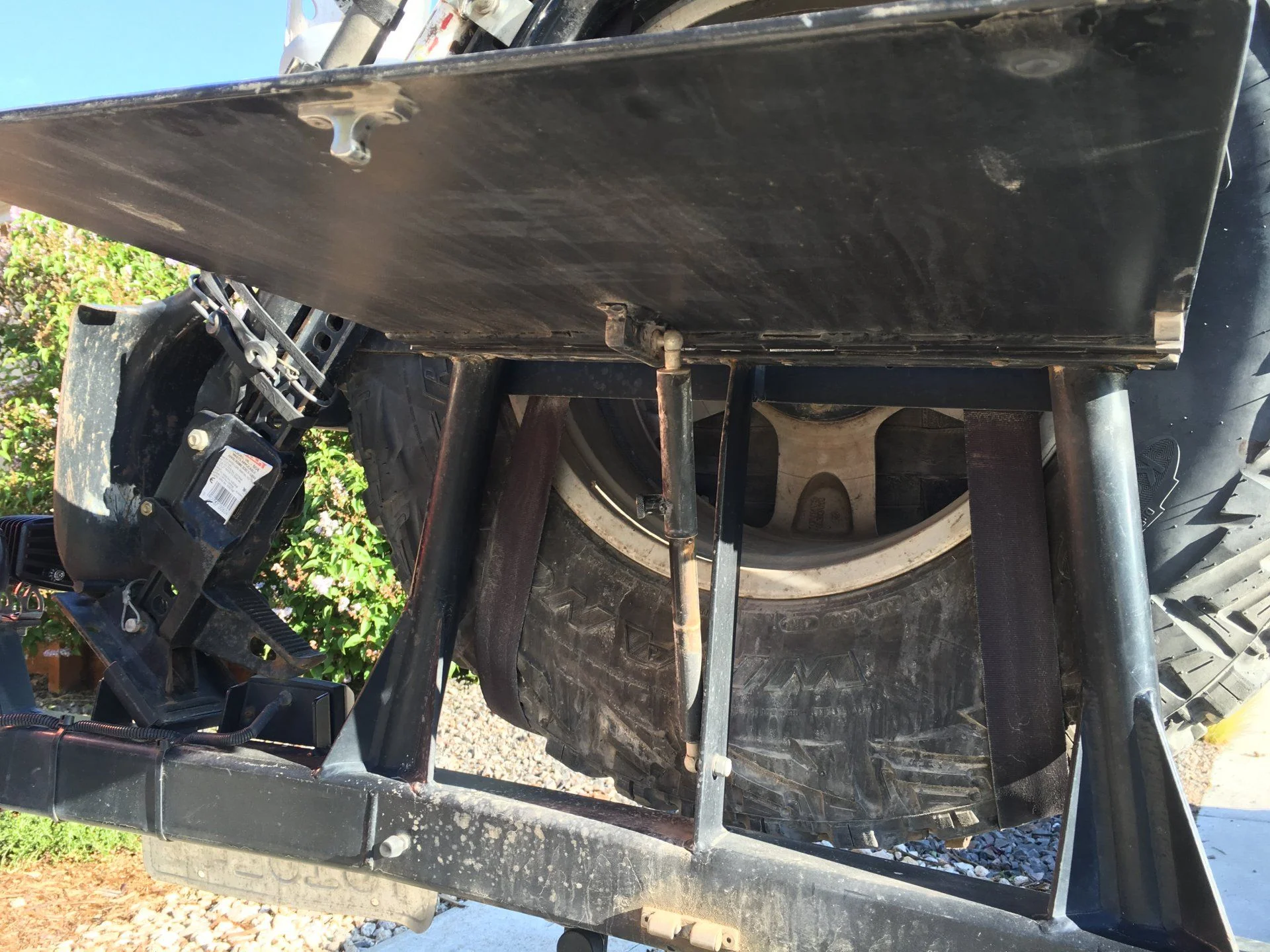 spressoFAB, LLC tire carrier fold down table
