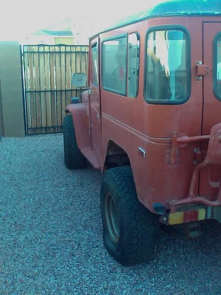Straight body, except for a little rear rust on the corners.