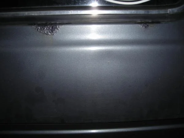 Tail gate bubbles with rust converter