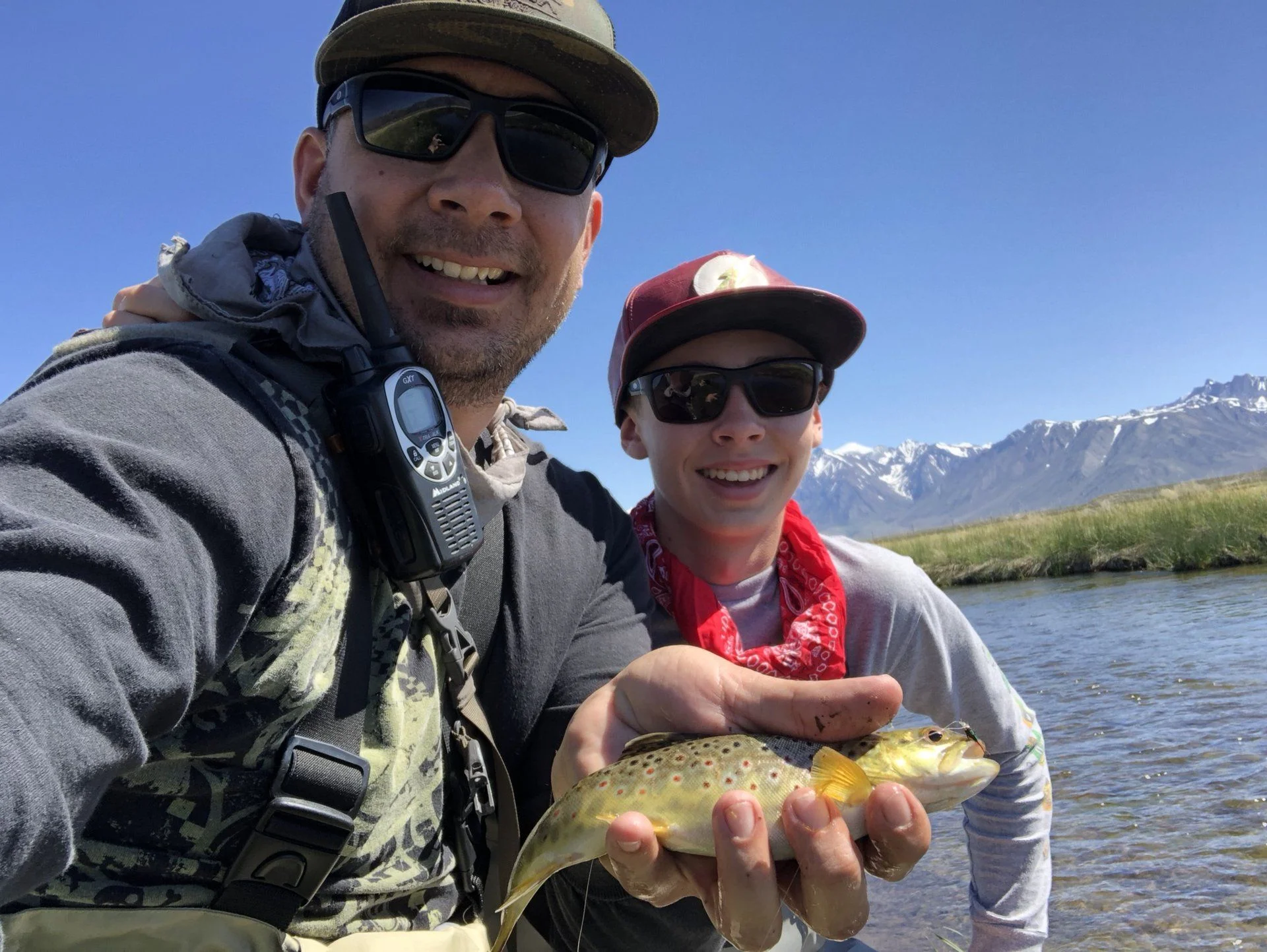 Teaching the son how to fly fish!