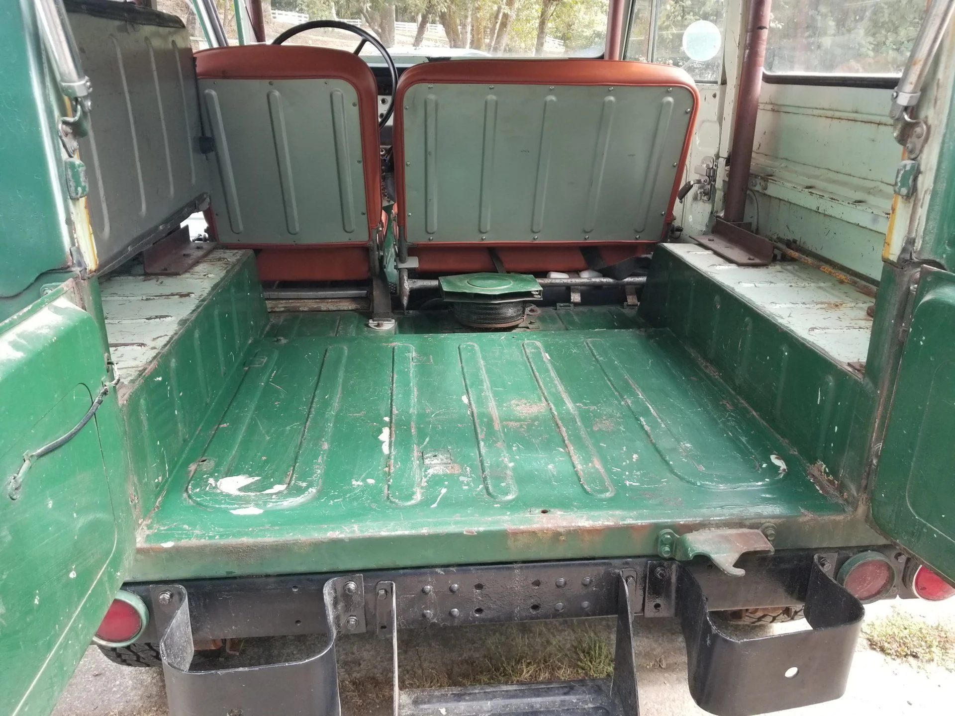 The back. Have both jump seats.