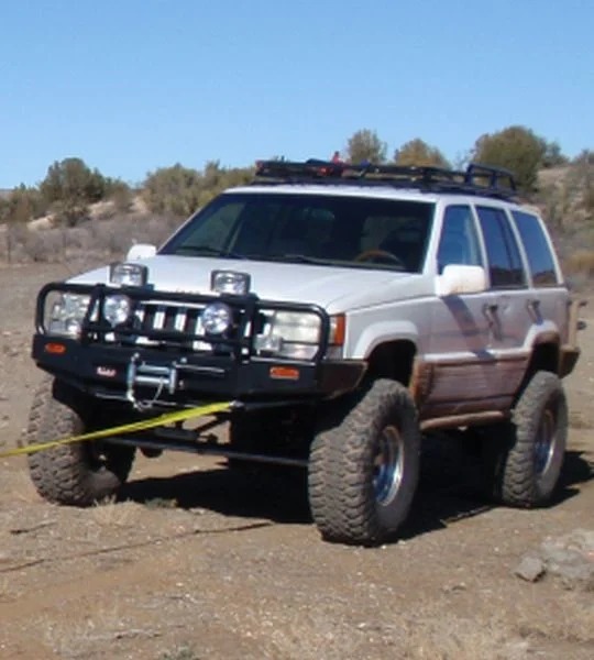 The old ZJ getting towed because the transmission was a POS, rebuilt 2 times in 6 months