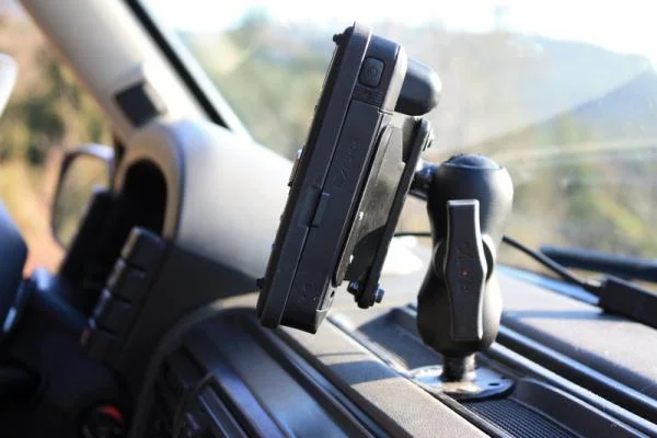 The TufTab is semi ruggedized and has a sunlight visible screen.  It's mounted on a RAM mount.