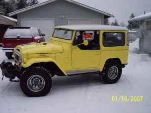 This is what the guy who bought it did...chopped the hardtop and windshield about 6"...he was short :/